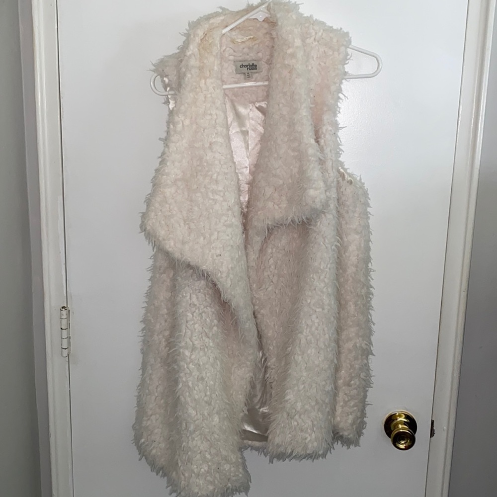 Fur sweater vest.